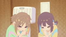 two anime girls are standing next to each other and one has a sign that says d on it