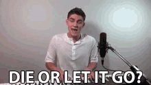a young man singing into a microphone with the words die or let it go