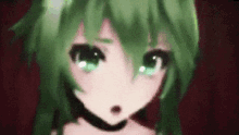 a close up of a anime girl with green hair and green eyes .