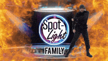 a man dancing in front of a spotlight light family logo