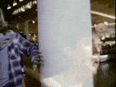 a blurred image of a person standing in front of a sign that says ' providence '
