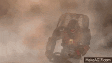 a robot is sitting in a room with smoke coming out of it 's eyes .