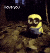 a yellow minion says i love you while standing in a dark forest