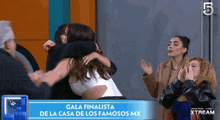 gala finalista de la casa de los famosos mx is shown on a television screen