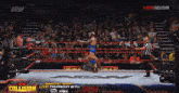 a wrestling ring with a sign that says collision