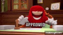 knuckles the echidna from sonic the hedgehog is sitting at a desk with his arms outstretched and says approved .