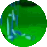 a green circle with a few drops of water coming out of it