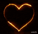 a heart made of fire on a black background with the word inshot at the bottom