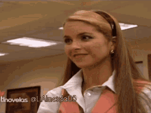 a woman wearing a pink vest and a white shirt with the hashtag liameido05 on the bottom right