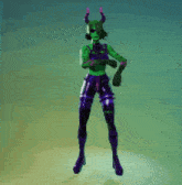 a green and purple cartoon character with horns on her head