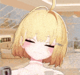 a girl with blonde hair is smiling in a room