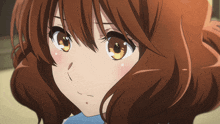 a close up of a girl with brown hair
