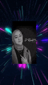 a woman wearing a hijab is standing in front of a banner that says d rune family