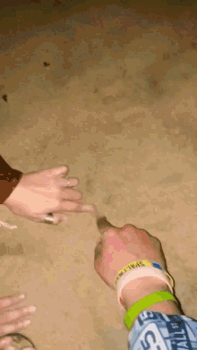 hands sand