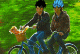two men are riding a tandem bike with a basket full of groceries