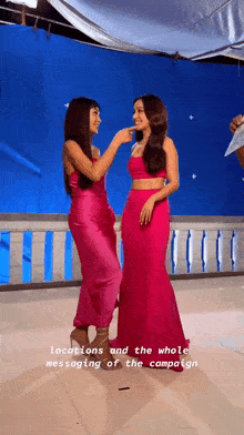 two women in pink dresses are standing next to each other with the words locations and the whole messaging of the campaign above them