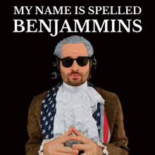 a man wearing a wig and sunglasses says his name is spelled " benjamins "