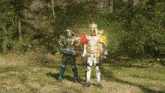 a couple of samurai standing next to each other with one holding a sword