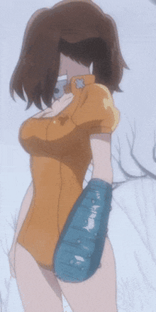 a girl with a glove on her arm and a star on her shirt