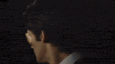 a blurry image of a person standing in a room