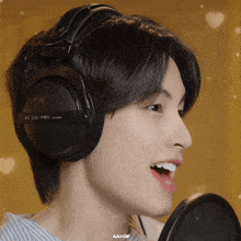 a close up of a person wearing a pair of headphones that say dt 770 pro