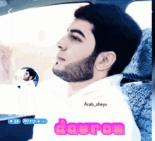 a man with a beard is sitting in a car with the name arab_sheyx