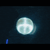 a blue background with a glowing white object in the middle