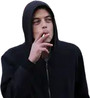 a man in a hoodie smoking a cigarette