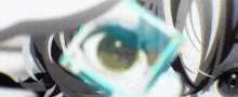 a close up of a person 's eye with a blue square in it .