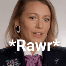 a woman wearing a purple tie and earrings says * rawr*