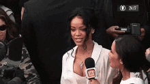 Rihanna GIF - Rihanna Boobs Interview GIFs