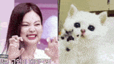 a woman is making a funny face next to a white cat with black spots on its face .
