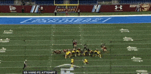 a football game is being played between the michigan panthers and the ohio state buckeyes
