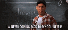 a man in a plaid shirt is standing in front of a blackboard with the words i 'm never coming back