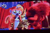 a cartoon of a monkey and a squirrel on a screen