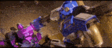 a blue robot and a purple robot are fighting each other .