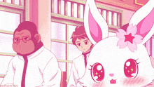 a monkey and a rabbit are standing next to each other and the rabbit has a flower in its hair