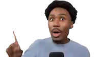 a man making a funny face with the words what is this above him