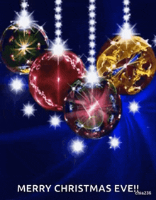 a merry christmas eve greeting card with christmas balls hanging from strings