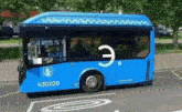 a blue bus with the number 430100 on the side of it