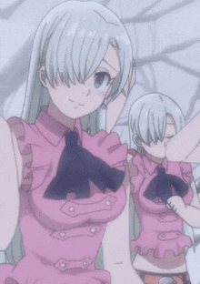a couple of anime girls are standing next to each other and one of them is wearing a pink shirt and tie .