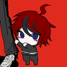 a cartoon character with red hair and blue eyes is standing next to a person