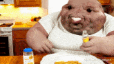 a man with a big head is sitting at a table with a plate of food and a bottle of pills