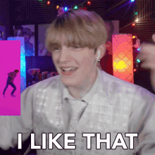 a man says " i like that " in front of a purple background