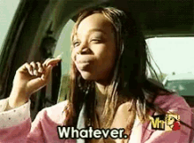 a girl in a pink jacket is sitting in a car eating chips and saying whatever