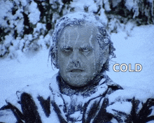 a man is covered in snow and the word cold is on the bottom