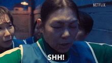 a woman says shh in a netflix ad