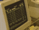 a computer monitor displays a job tracker