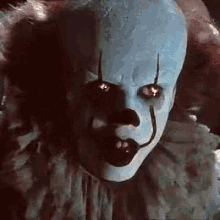 a close up of a clown 's face from it chapter two