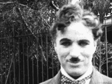 Charlie Chaplin Smile GIF - Charlie Chaplin Smile Vintage GIFs